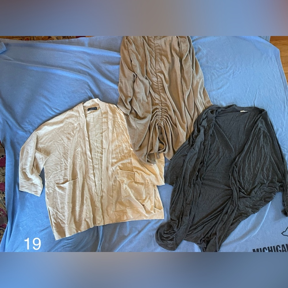 Set of 3 cardigans.